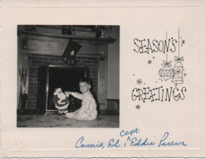 Old Christmas card with a photo of Capt. Eddie as a toddler.